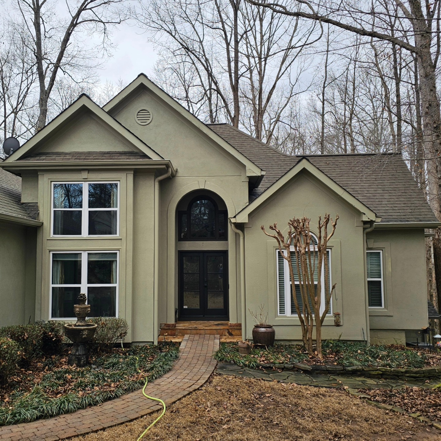 Two-story home exterior ready for soft wash cleaning